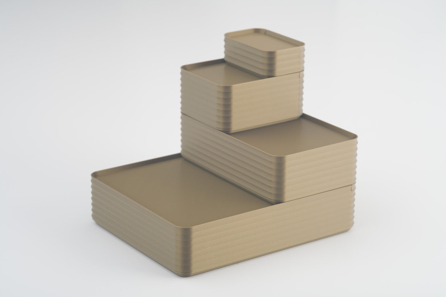 Z Co Projects Rib Series box bronze set of four mini, small, original, and double-wide displayed on a white background.
