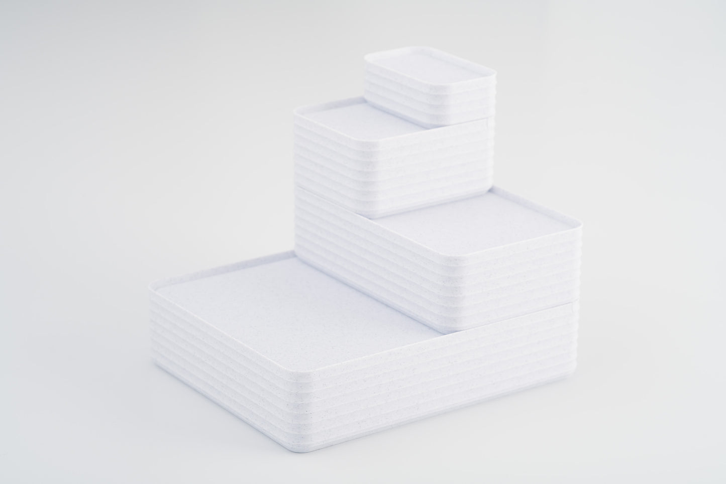 Z Co Projects Rib Series box marble white set of four mini, small, original, and double-wide displayed on a white background.