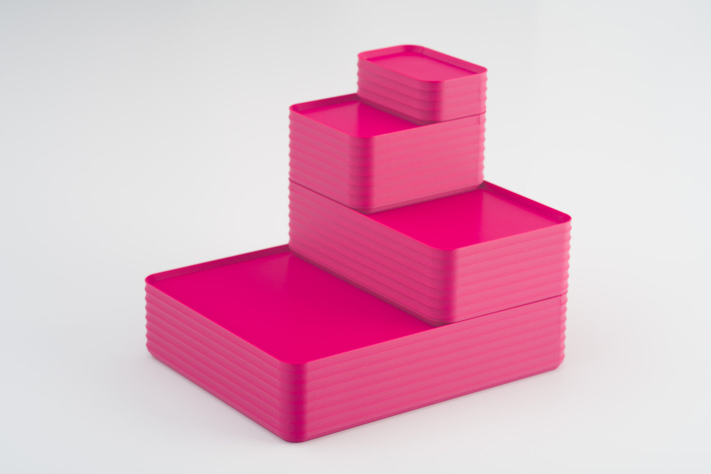 Z Co Projects Rib Series box matte fuchsia set of four mini, small, original, and double-wide displayed on a white background.