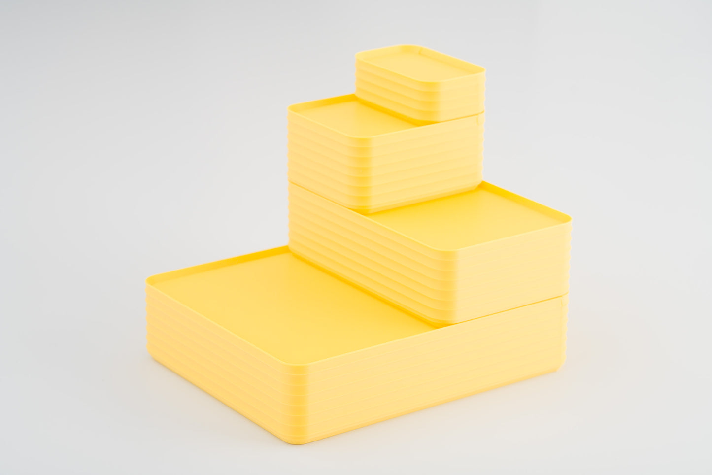 Z Co Projects Rib Series box matte lemon yellow set of four mini, small, original, and double-wide displayed on a white background.