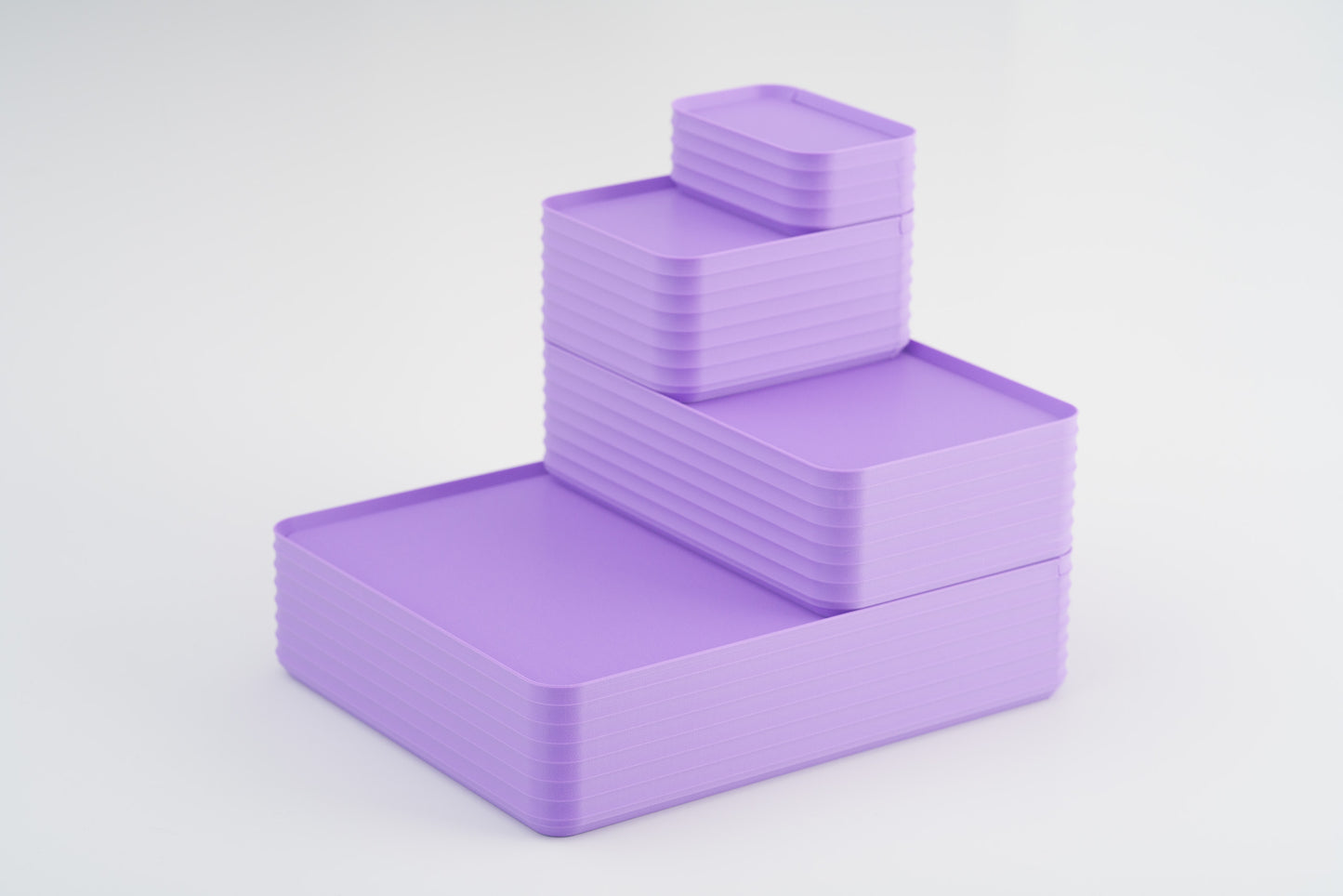 Z Co Projects Rib Series box matte lilac purple set of four mini, small, original, and double-wide displayed on a white background.
