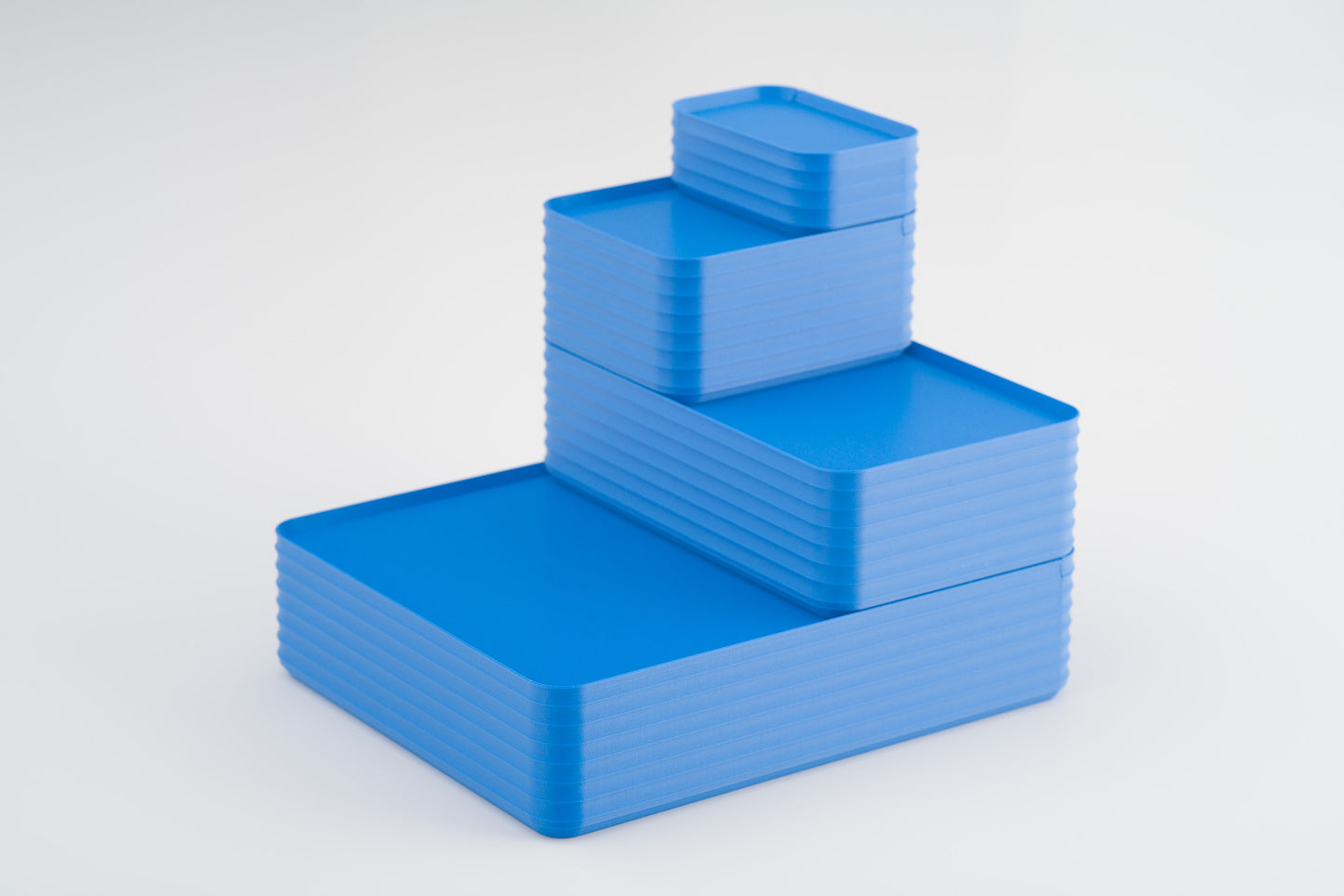 Z Co Projects Rib Series box cobalt blue set of four mini, small, original, and double-wide displayed on a white background.