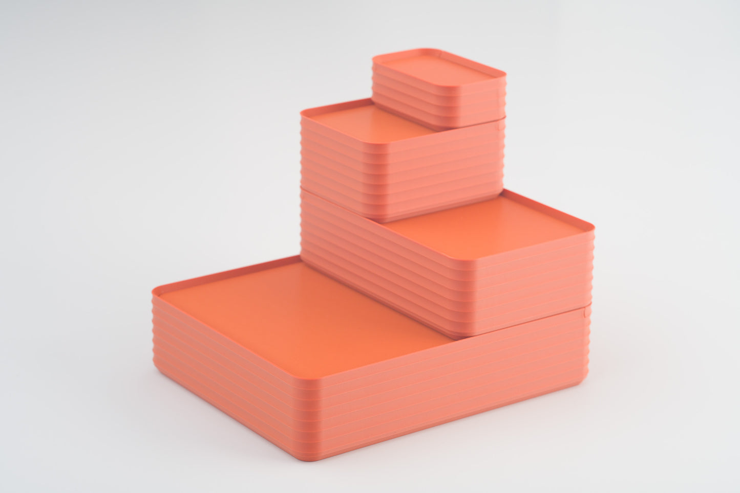 Z Co Projects Rib Series box matte terracotta set of four mini, small, original, and double-wide displayed on a white background.