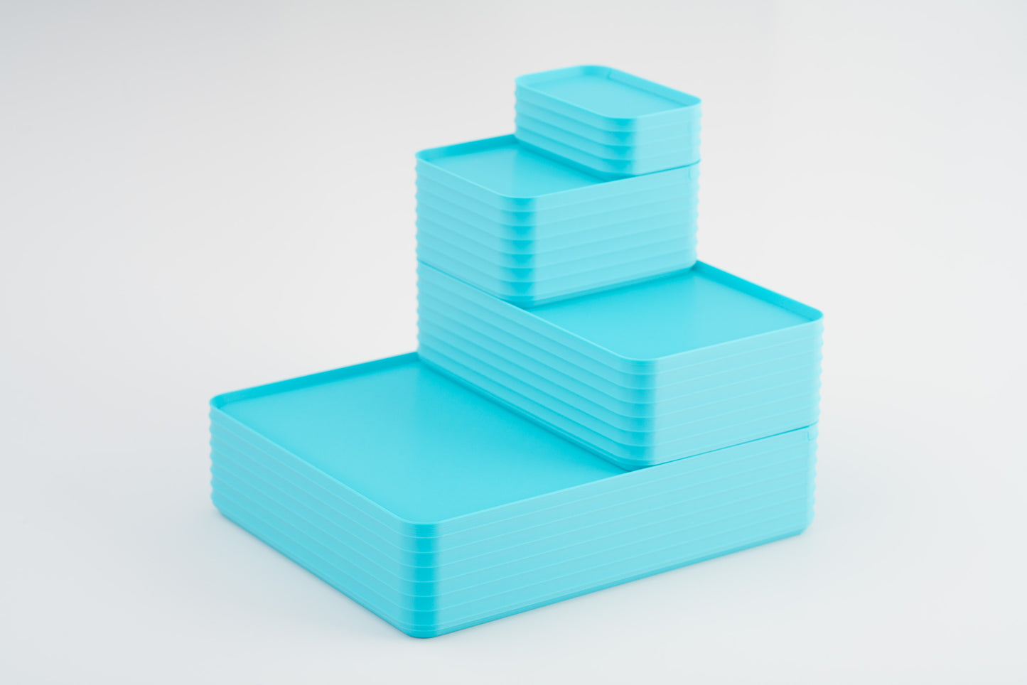 Z Co Projects Rib Series box turquoise set of four mini, small, original, and double-wide displayed on a white background.