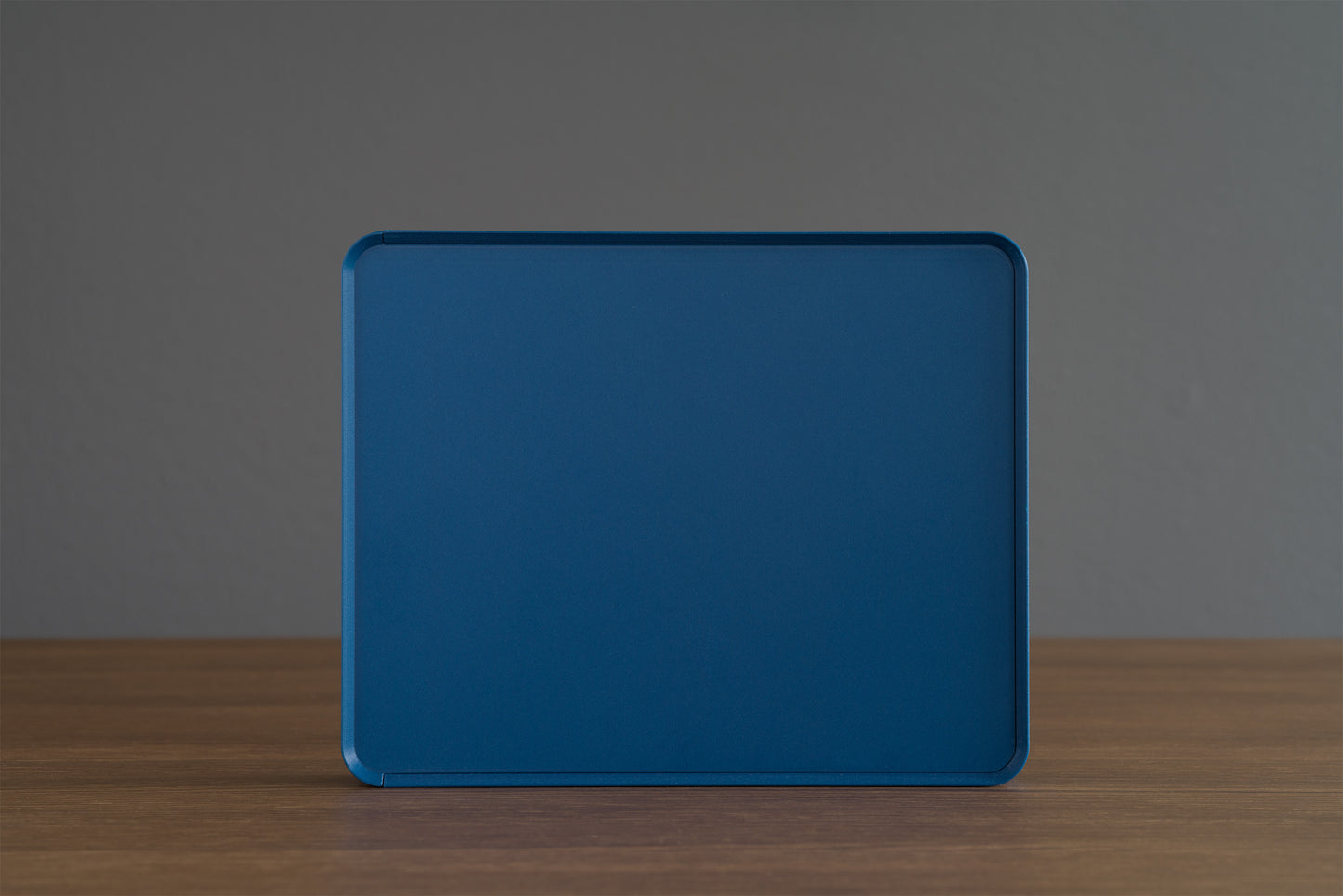 Top view of the Z Co Rib Series Double-Wide Box in matte dark blue, positioned upright on its side and fully closed. Minimalist, modern storage design with ribbed texture and clean edges.