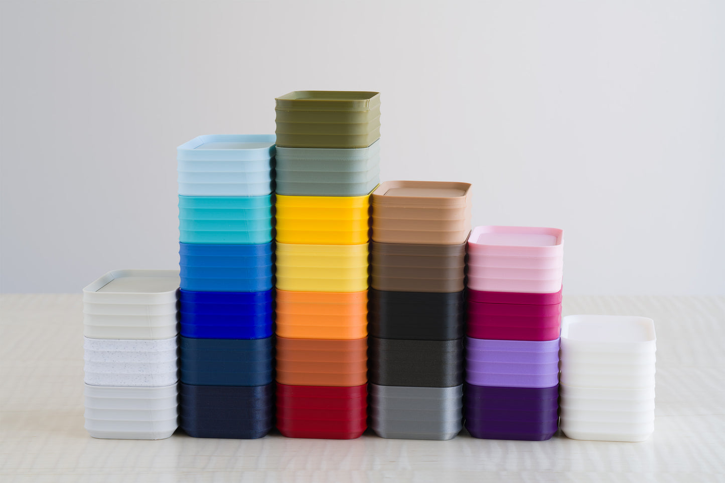 A full collection of Z Co Rib Series mini boxes displayed in a color gradient arrangement, featuring every available color finish from muted neutrals and bright primaries to soft pastels and deep tones.