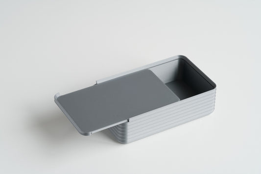 Z Co Rib Series Box Original Silver, open with sliding lid halfway across, on white background.
