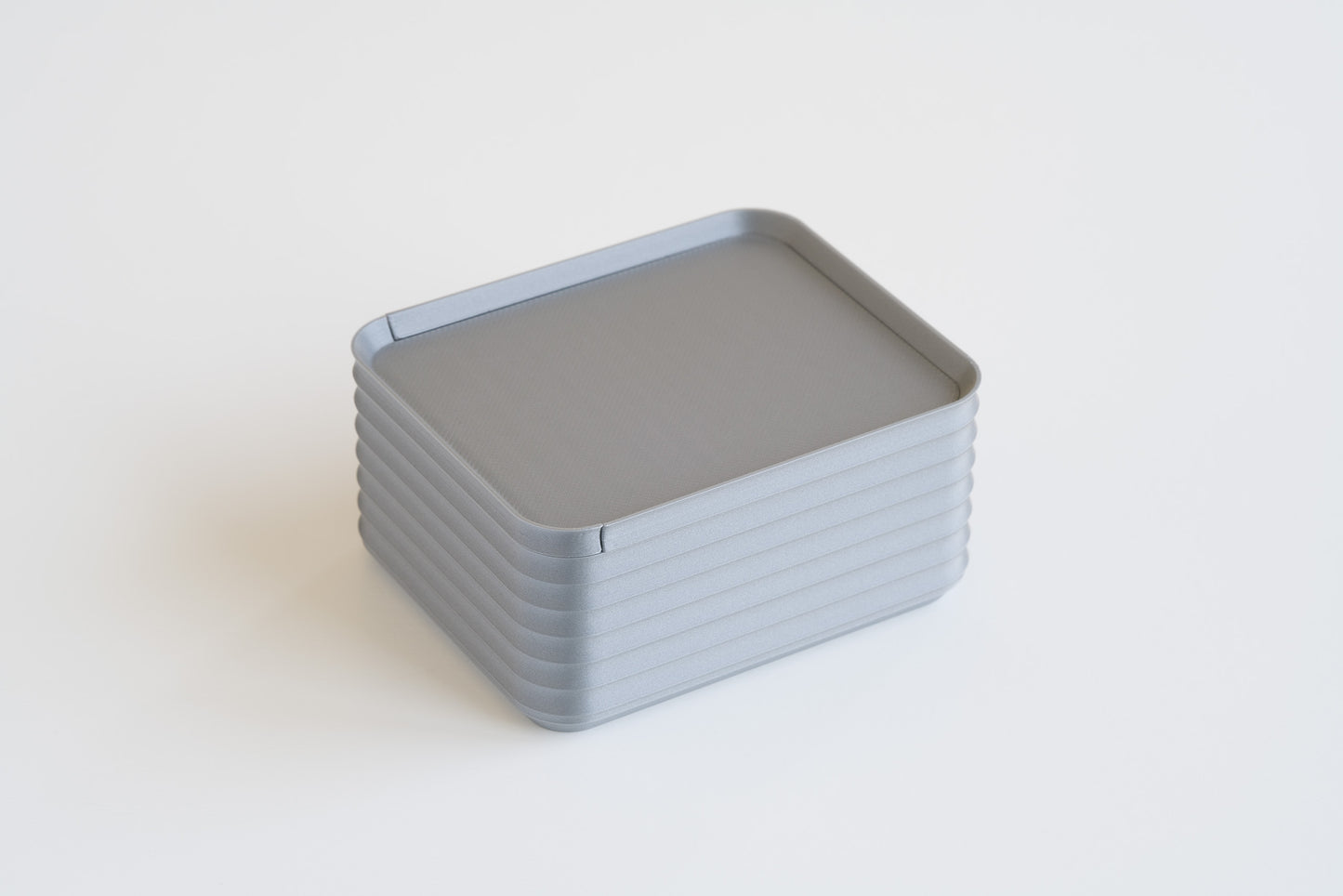 Small silver Z Co Rib Series box displayed on a white background.