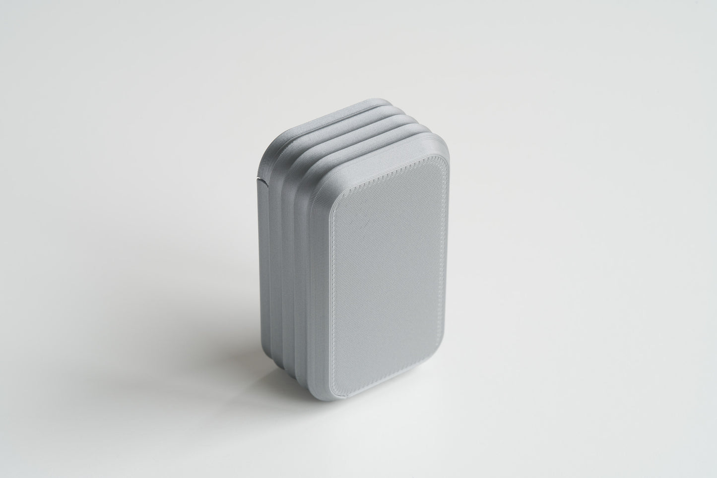 Bottom view of silver mini box by Z Co on white background