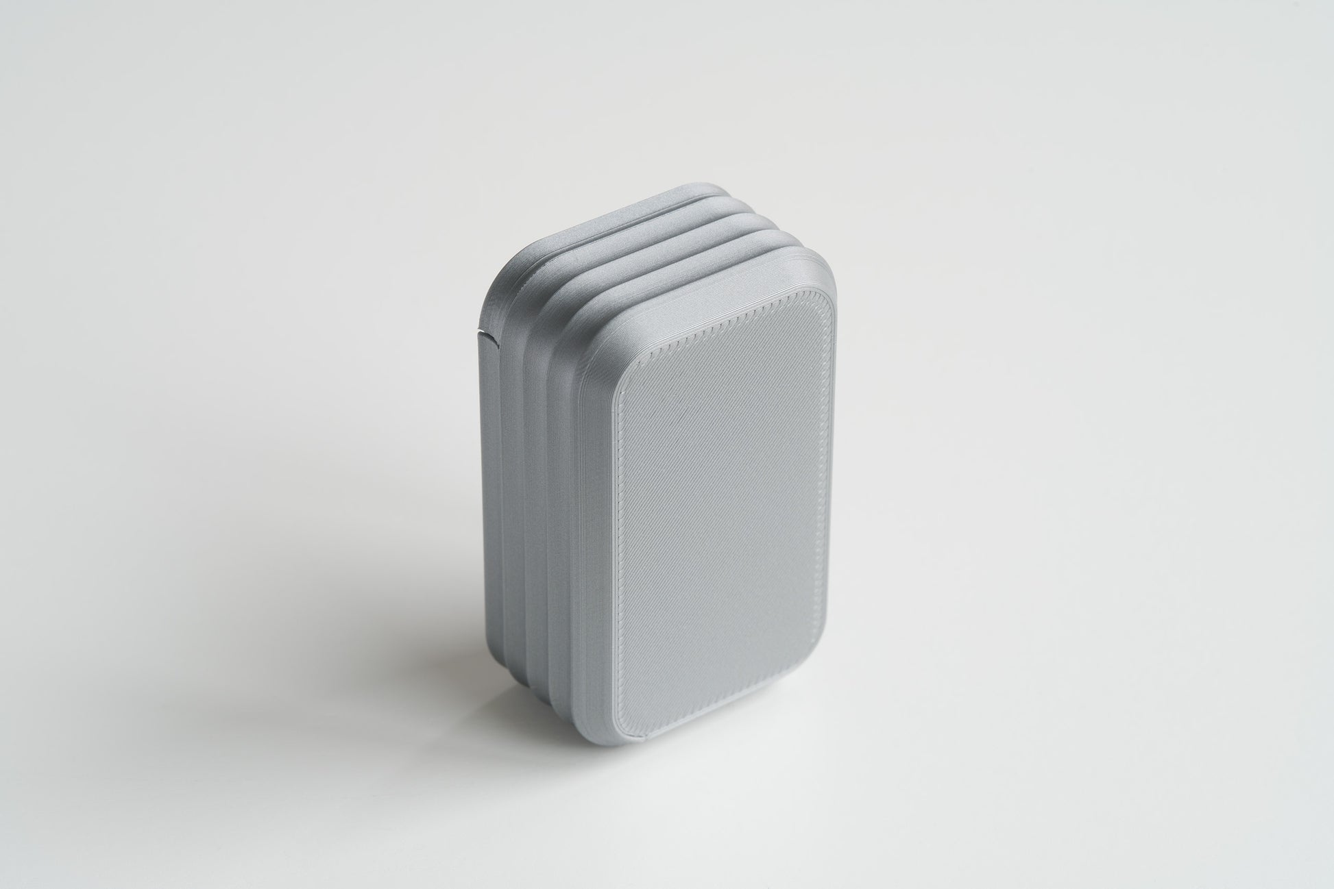 Bottom view of silver mini box by Z Co on white background